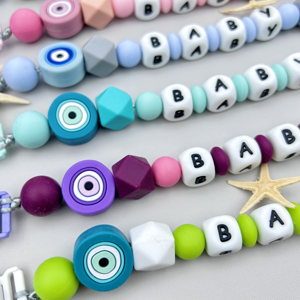 مخصص الإنجليزية الروسية سيليكو - مراجعة Baby Pacifier Clip وسعره