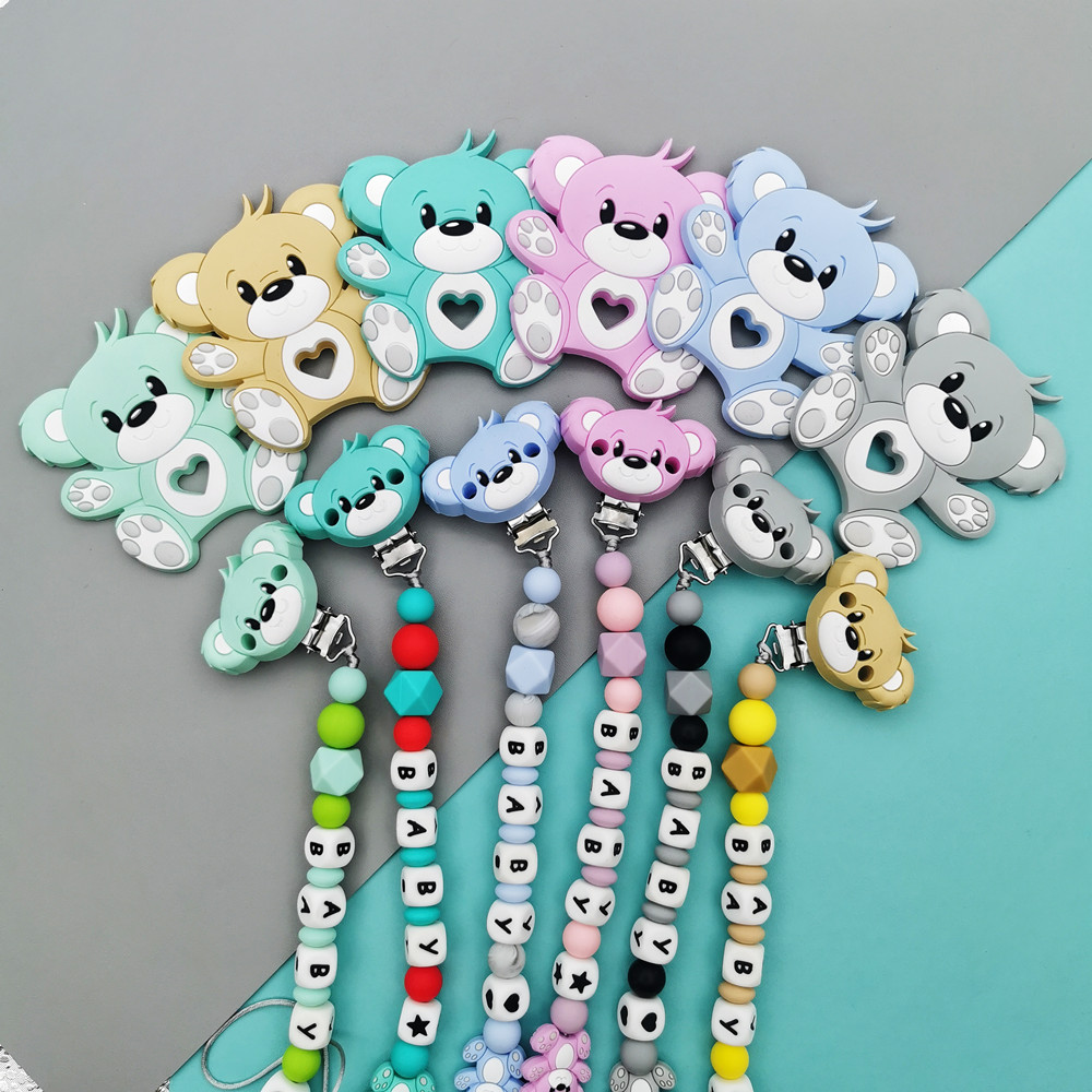العرف الإنجليزية الروسية سيليك - مراجعة Baby Pacifier Clip وسعره
