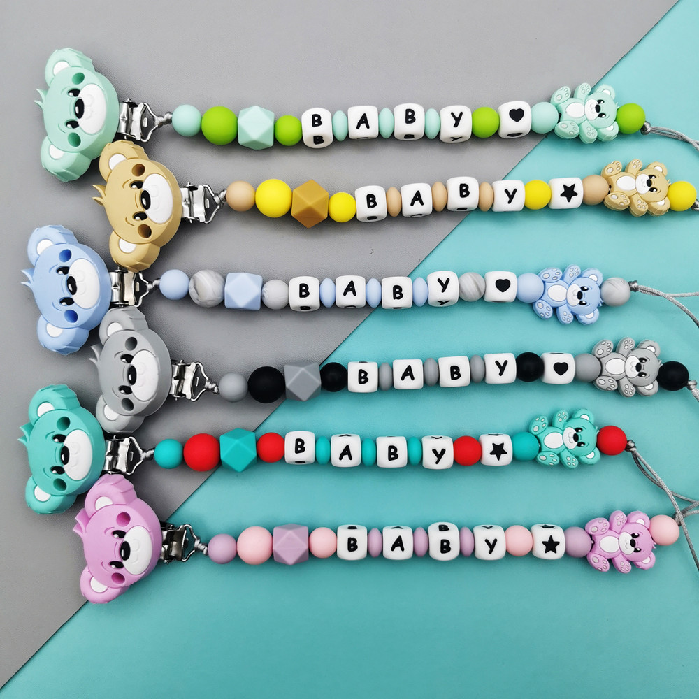 العرف الإنجليزية الروسية سيليك - مراجعة Baby Pacifier Clip وسعره